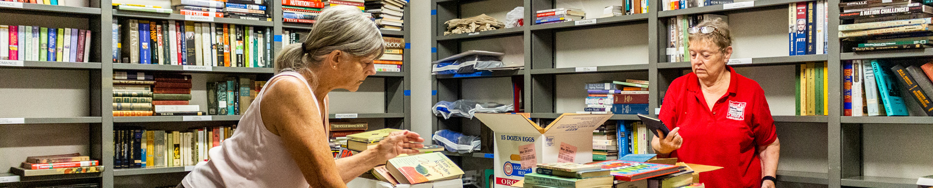 Friends of the library sorting donations