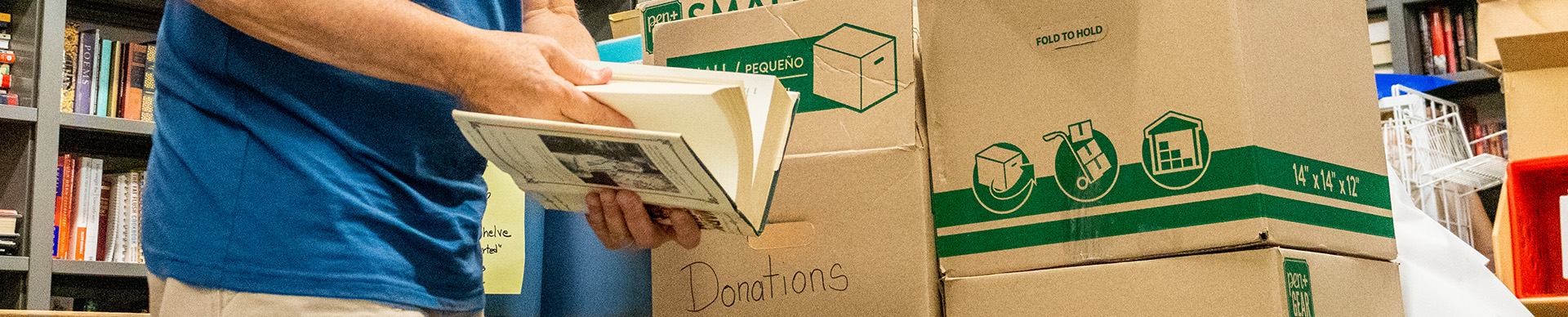 Friend of library sorting donations